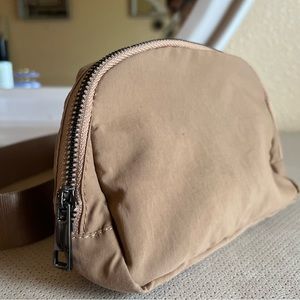 Curl surf everywhere belt bag brown color